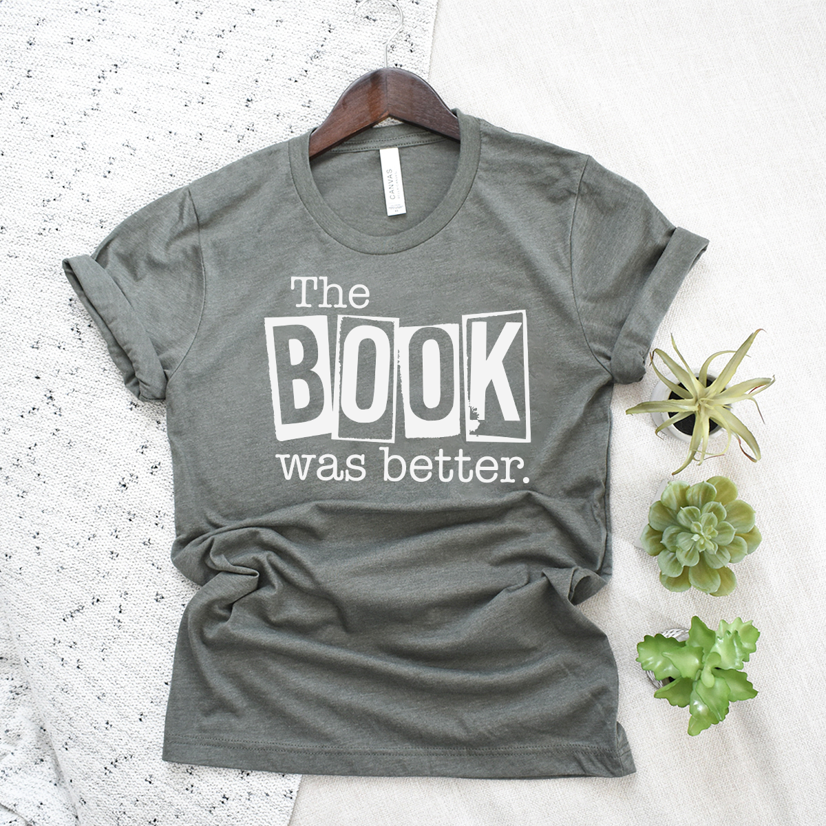 book was better unisex tee