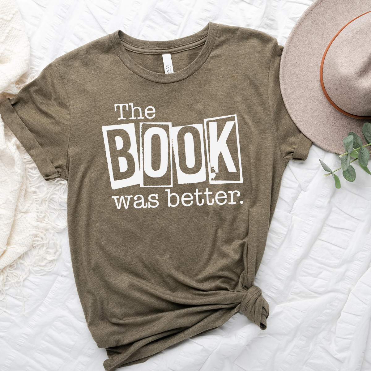 book was better unisex tee